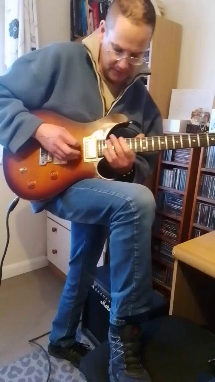 classical rock guitar playing 